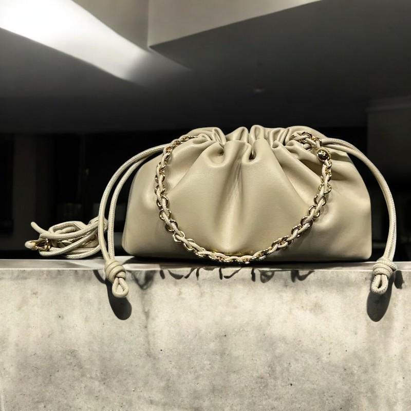 Luxury Cowhide Leather Crossbody Bag | Retro Drawstring Lucky Bag with Chain | European & American Style Shoulder Bag