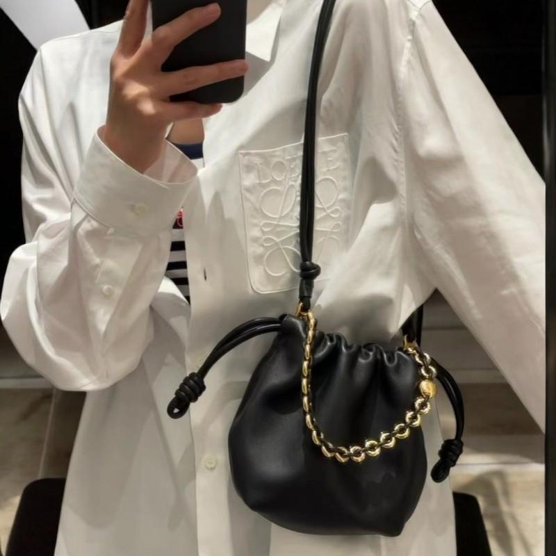 Luxury Cowhide Leather Crossbody Bag | Retro Drawstring Lucky Bag with Chain | European & American Style Shoulder Bag
